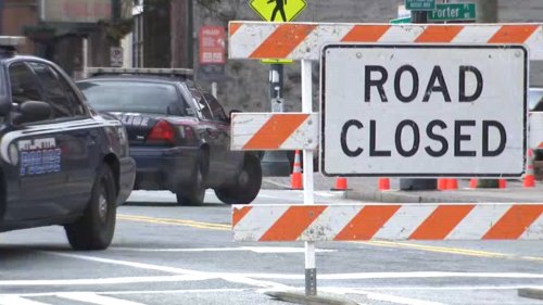 Several Atlanta roads closed to change old SunTrust building sign