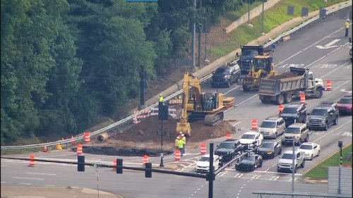 Crews still working to repair large sinkhole along I-285 exit ramp in Cobb County