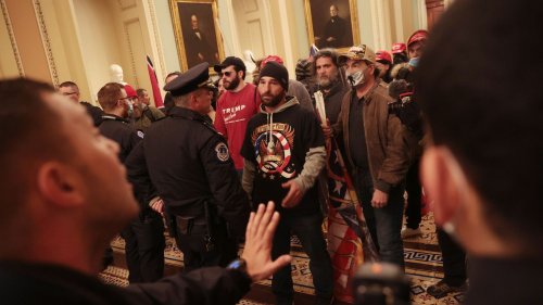 Federal jury convicts QAnon believer who led charge during Capitol riot