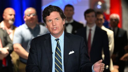Scoop: Fox News says Tucker Carlson breached his contract