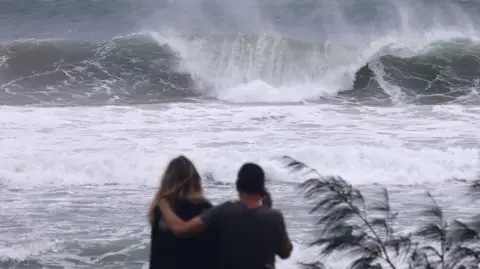 Five dead as huge waves hit Australia coast