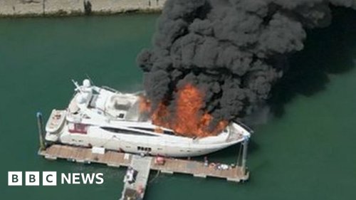 Superyacht sinks in Torquay harbour after large fire