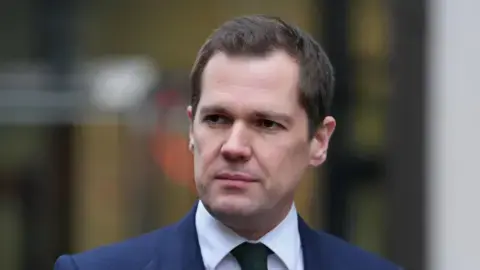 Jenrick adds hundreds to WhatsApp group in mix-up