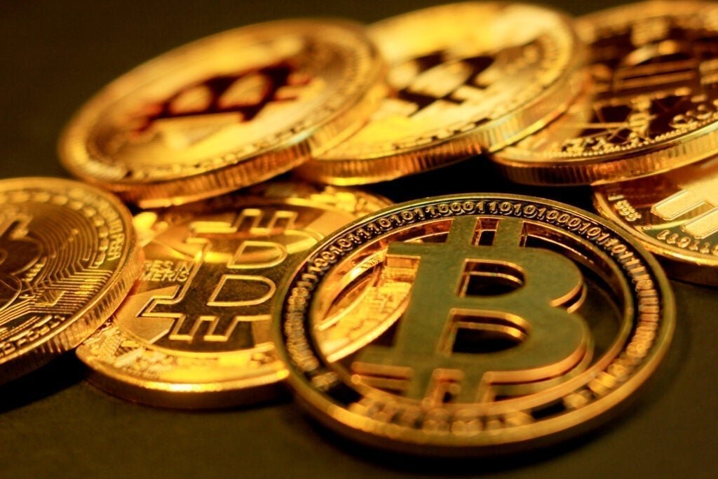 Bitcoin Holds $71,000 As Ethereum, XRP, Dogecoin Test Breakout Levels