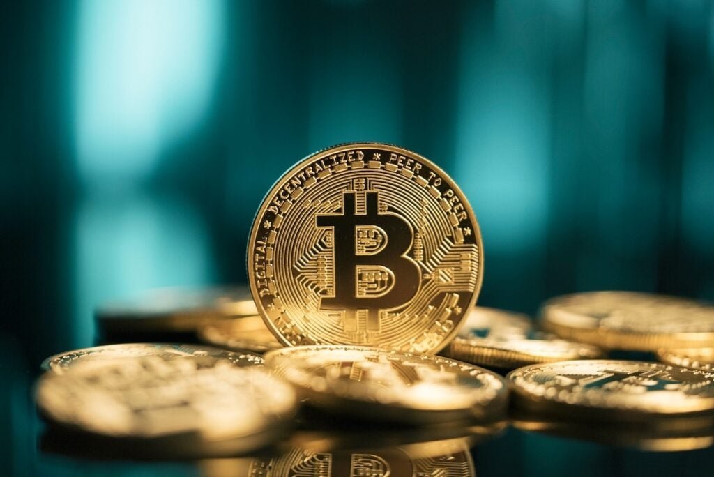 Bitcoin, XRP Steady, While Ethereum, Dogecoin Fall Amid Iran Truce Optimism: Analyst Warns Sharp Rise In Bullish Sentiment A 'Caution Flag'