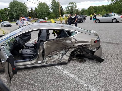 Somehow, everyone walked away from this massive Tesla crash