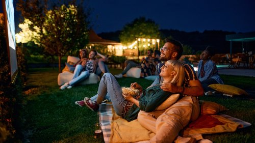 Projectors Vs. Outdoor TVs: Which Is Best For Watching Movies Outside?