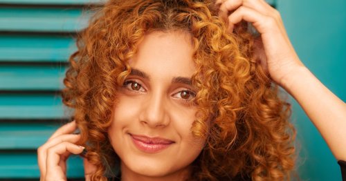 Why did humans evolve curly scalp hair?