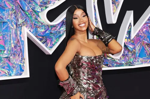 Cardi B is draped in pearls (and not much else) while partying in NYC