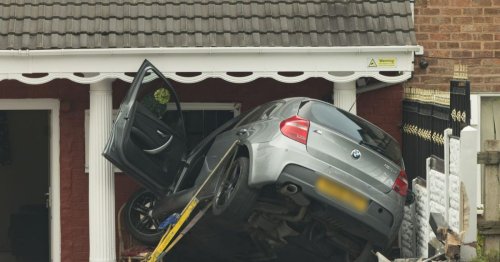 Emergency updates live as BMW ploughs into Birmingham home