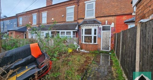 House for sale for £300K with boarded up front door and sofa in garden