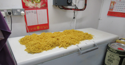 'Filthy' Horley takeaway where cooked noodles were dumped straight on top of freezer