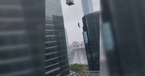Toronto construction worker dangles from crane in shocking incident caught on video