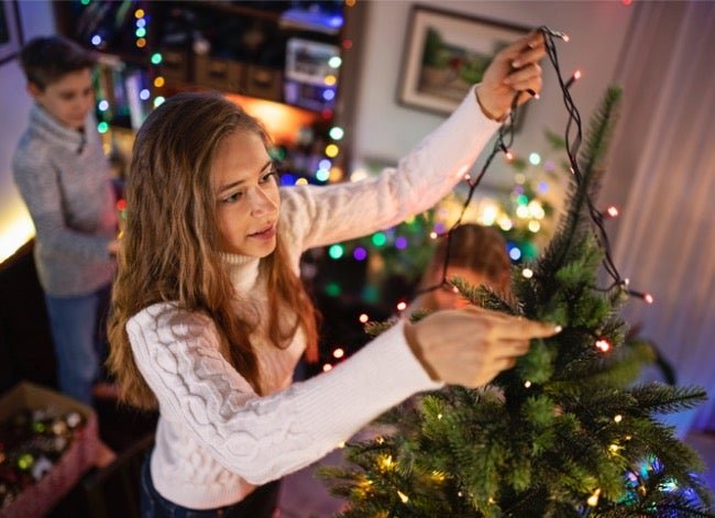 The Trick to Hanging Lights on a Christmas Tree, Explained