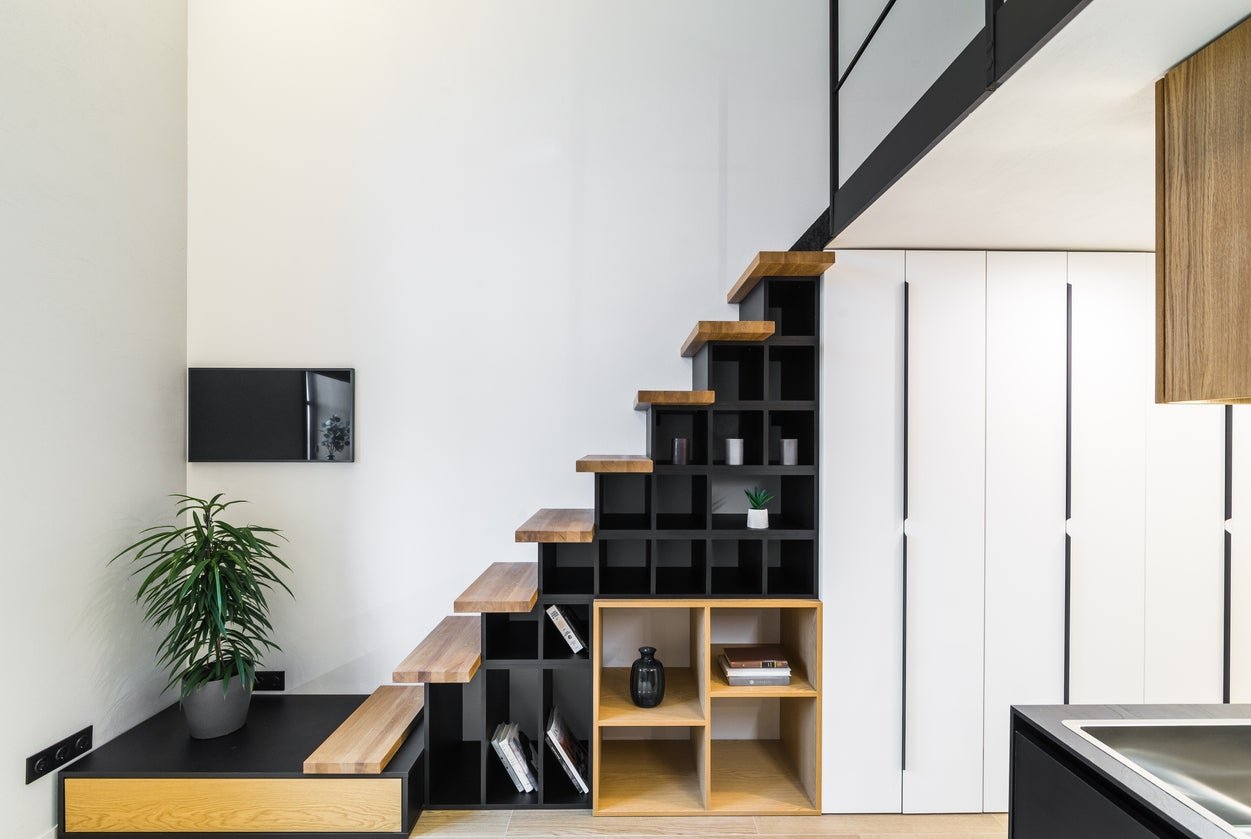 17 Clever Uses for the Space Under the Stairs
