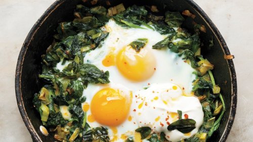 Skillet-Baked Eggs With Spinach, Yogurt, and Chili Oil
