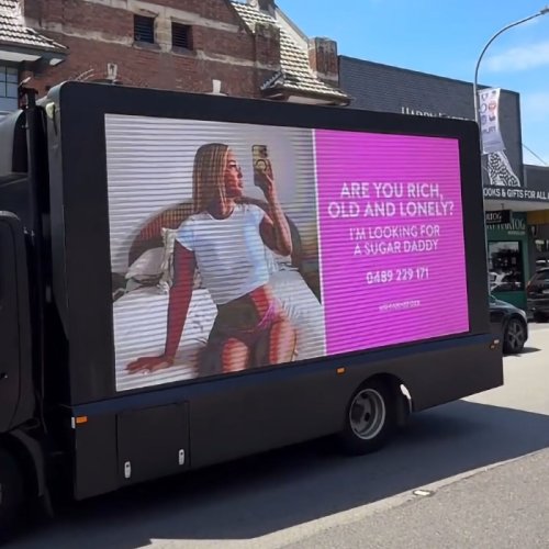 “Bikini Tradie” Sparks Outrage After Renting Mobile Billboard Looking For A “Sugar Daddy”