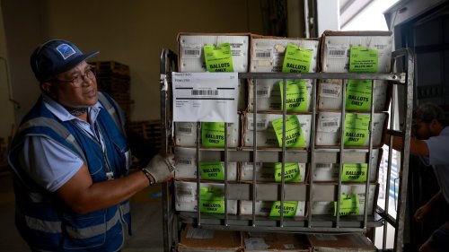 Judge clears the way for Postal Service work on Trump's mail-in voting order for now
