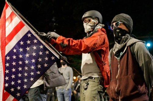 Portland protester catches tear gas cannister with lacrosse stick, sends it back