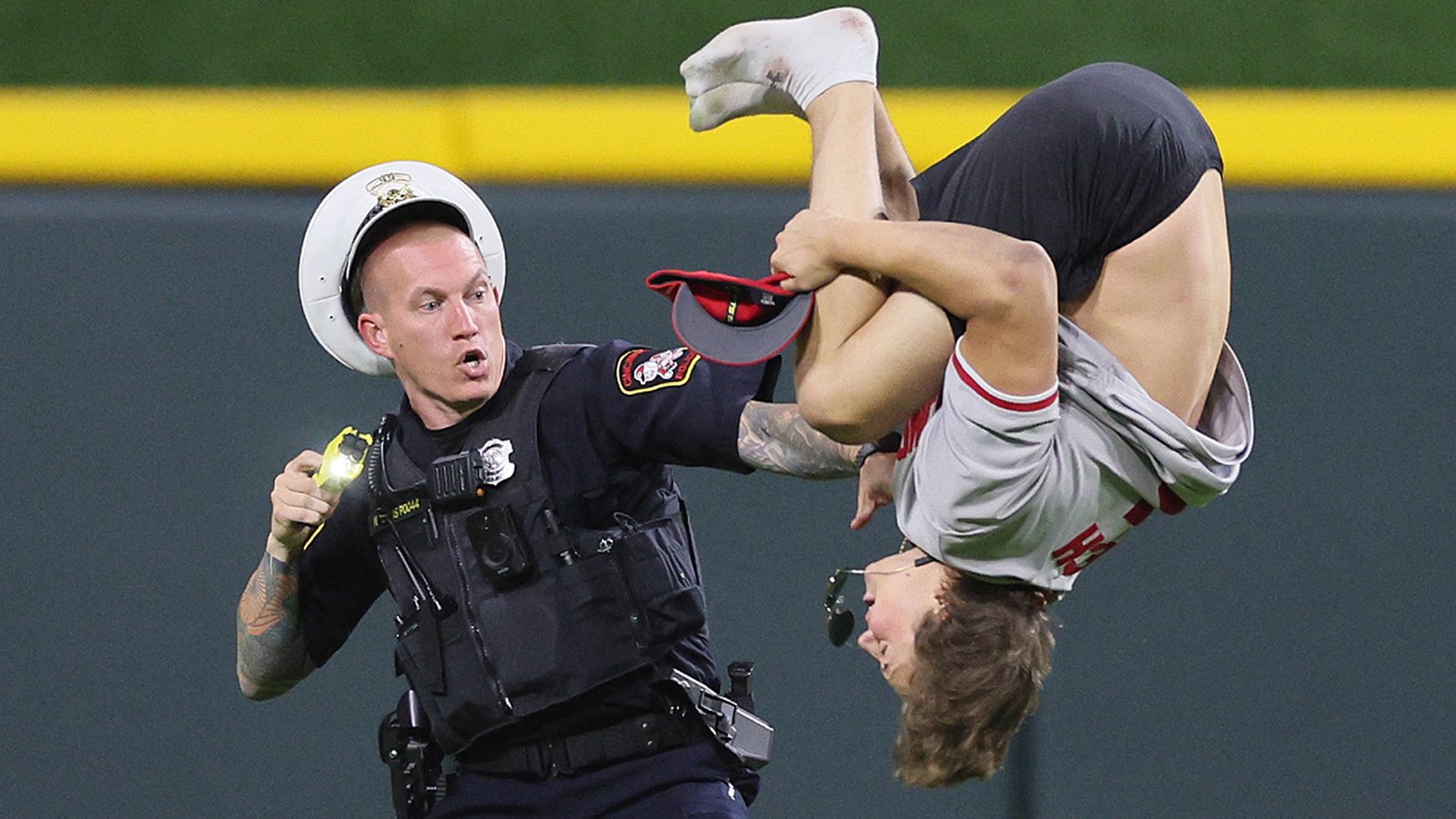 Streaker At Reds Game Does A Backflip In A Cop's Face Before Getting Tased Into Oblivion