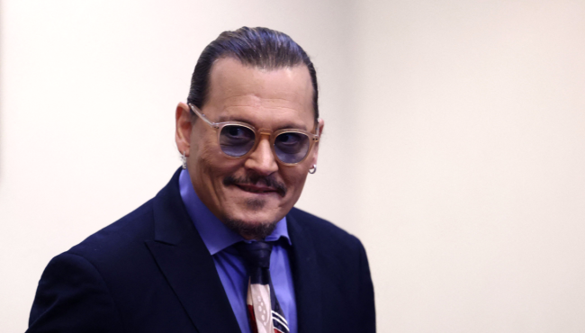 Bizarre TikTok Video Of People Throwing Gifts At Johnny Depp As He Leaves Court Goes Viral