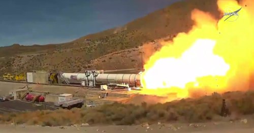 NASA fires up rocket booster in crucial test before human flight to the Moon