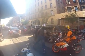 Insane Video Of SUV Running Over Bikers, Bikers Then Retaliating By Bashing In SUV's Windows