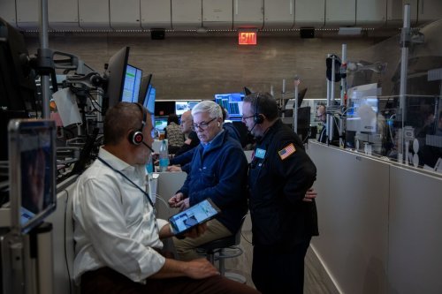 Stocks Tumble at Open as Weak Economic Data Dents Confidence