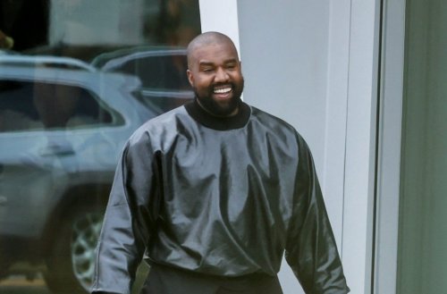 Kanye West Rocks Shoulder Pads And Sock Shoes, Twitter Collectively ...