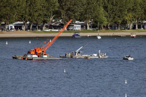 Recovery of a barge which sunk in Gellatly Bay is underway (West Kelowna)