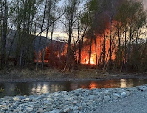Multiple homes believed to be on fire near Vought Park in Merritt