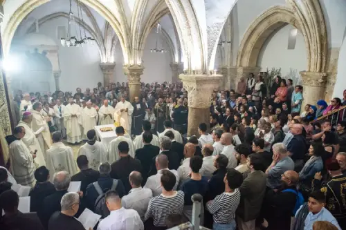 PHOTOS: Friars and faithful gather in Upper Room in Jerusalem to mark the Last Supper