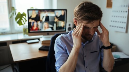 At home for a year, office workers complain of aches, pains and Zoom fatigue