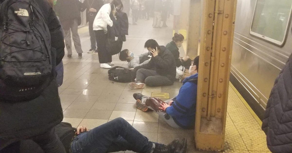 Witnesses of Brooklyn subway shooting recall "smoke and blood and people screaming"