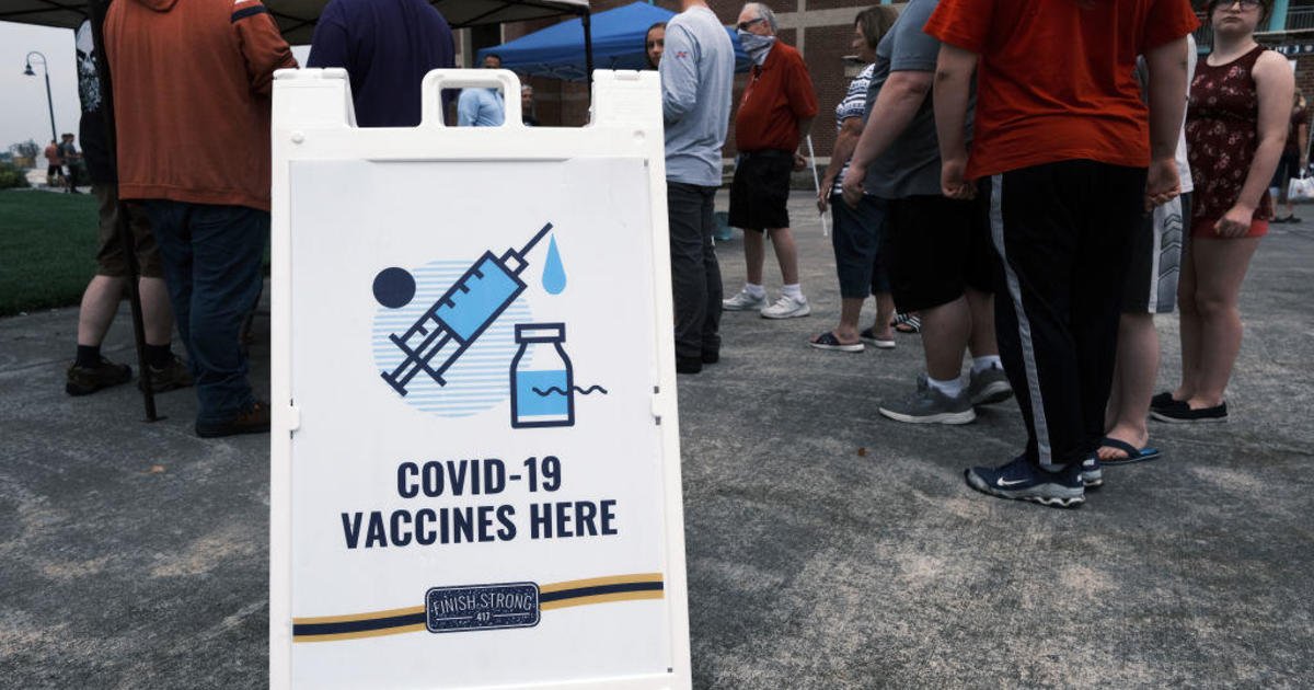 Fight over booster shots heats up as COVID cases surge in areas with low vaccination rates