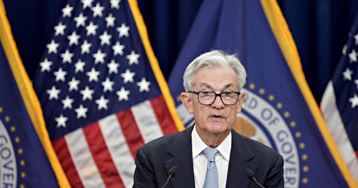 Federal Reserve hikes its key interest rate a quarter point