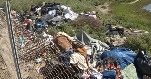 Cleanup of homeless encampment along Santa Ana River hits a snag in Newport Beach