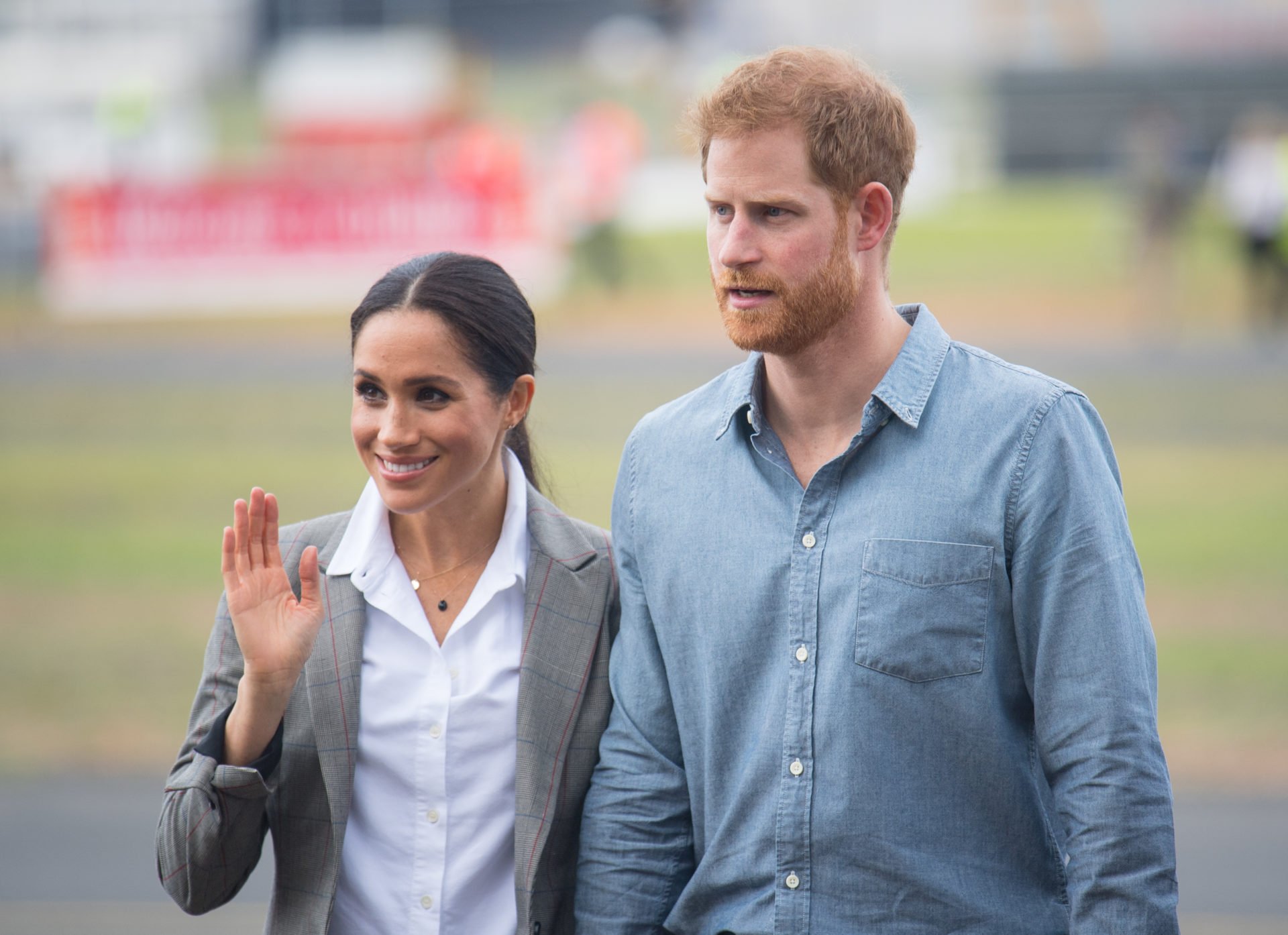 'Dominant' Meghan Markle embraces celebrities but Harry seems 'uncomfortable' - cover