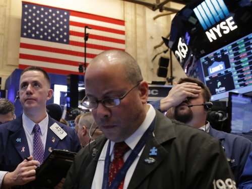 Wall Street en baisse, entre doutes sur les taux et résultats mitigés