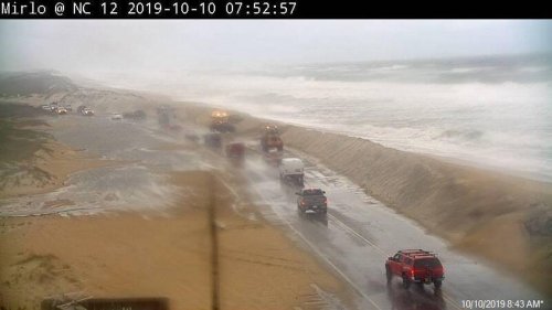 Outer Banks flood as storm breaches dunes, sends waves crashing onto roads and homes