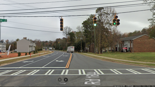 Driver hit woman by road, then shoved her into SUV, CMPD says. Search underway