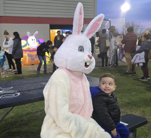 No sun, no problem for kids eager to grab Easter eggs during South Elgin’s glow-in-the-dark hunt