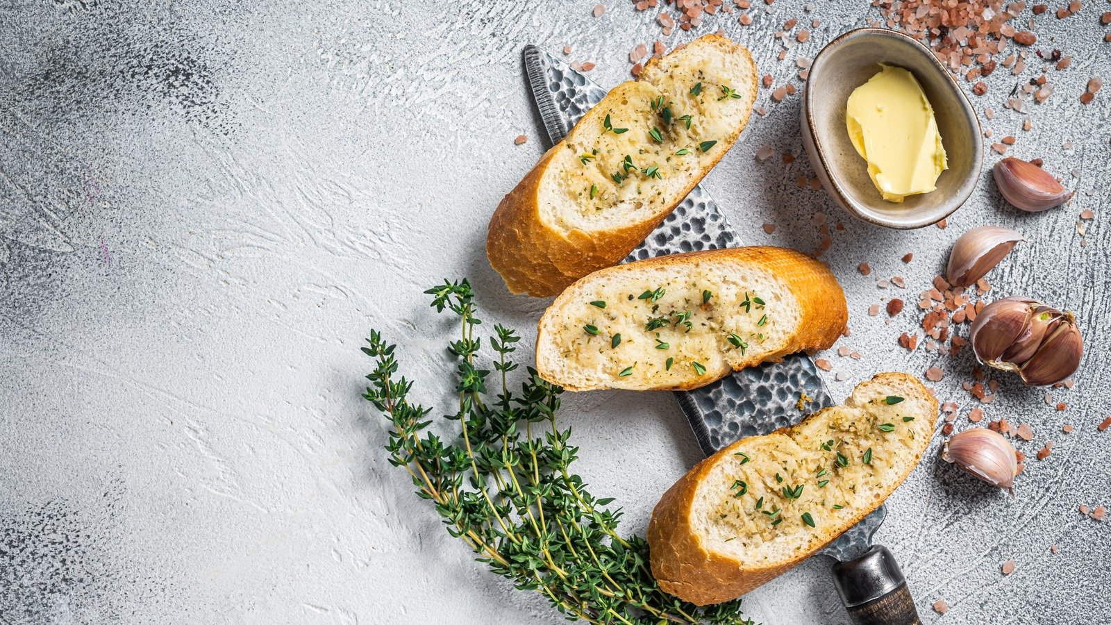For Ultra Flavorful Garlic Bread, Double Down On The Garlic