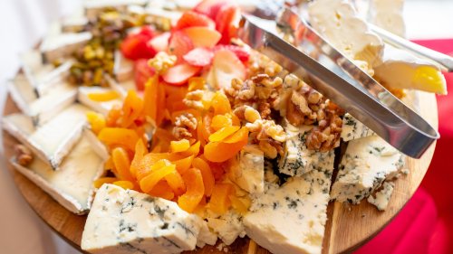 The Knife Mistake That Spoils Your Fancy Cheese Board
