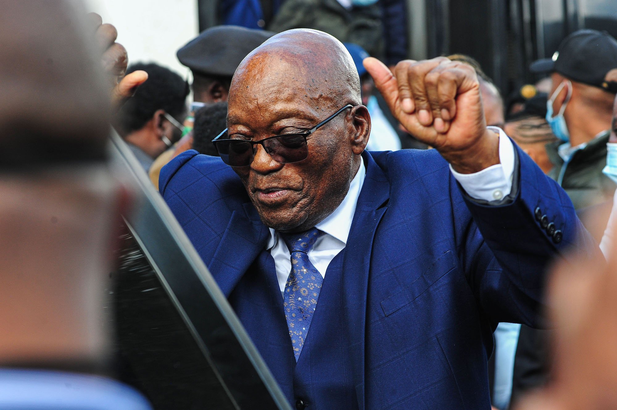 Zuma, surrounded by cops, should be the easiest man in the world to arrest