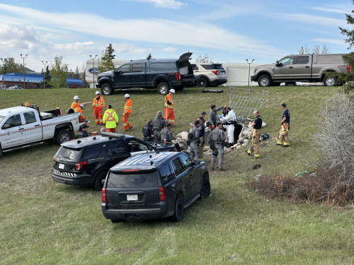 Charges laid after man sets fire to NW house, hides out in culvert: Calgary police