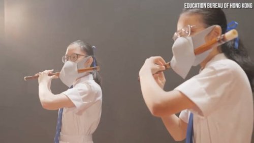 Hong Kong propaganda video showing ‘double-masked’ flute players catches attention