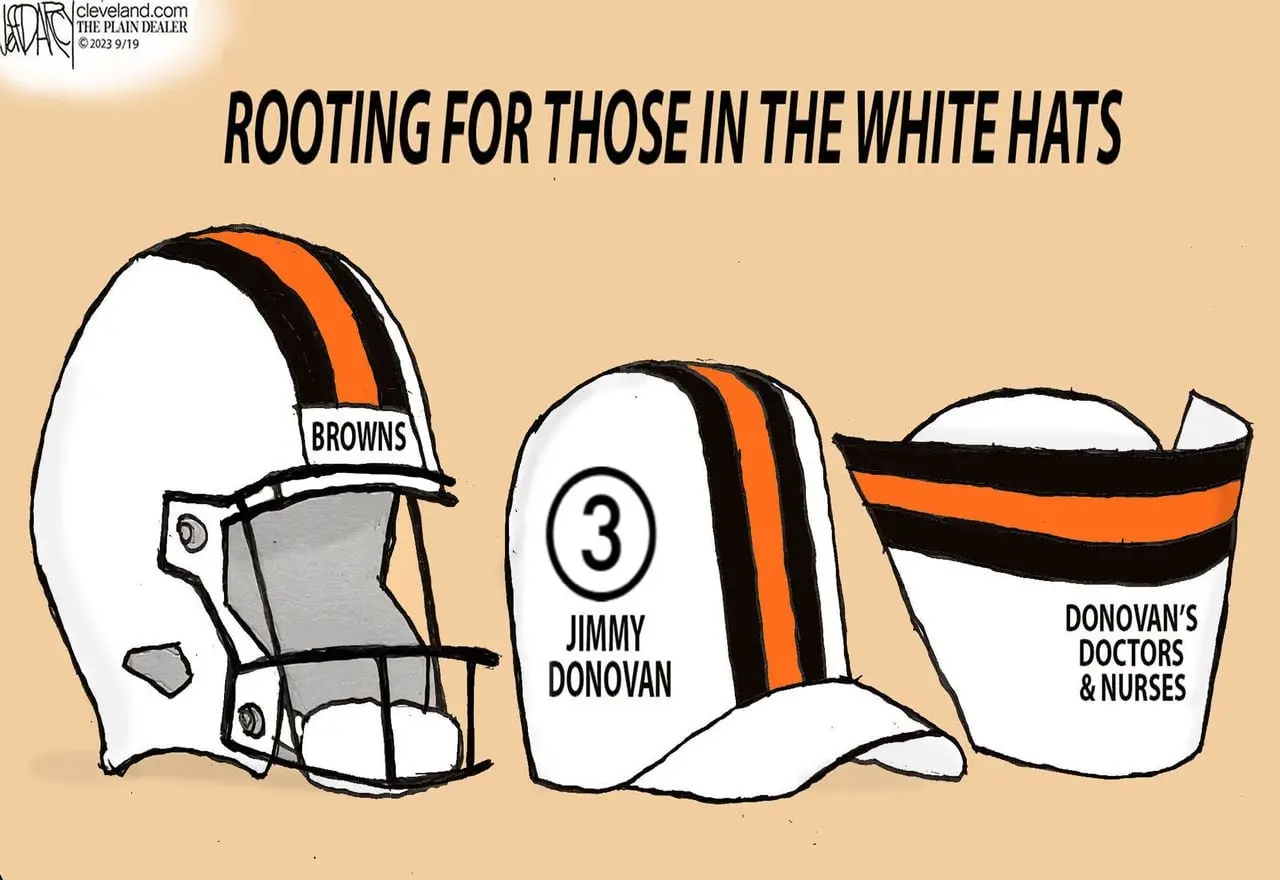 Browns new/old white helmets: Darcy cartoon 