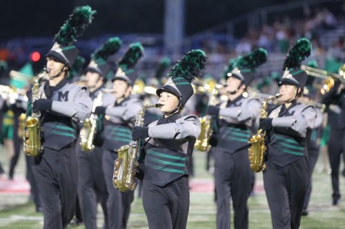 Medina High marching band does its part in helping football team defeat