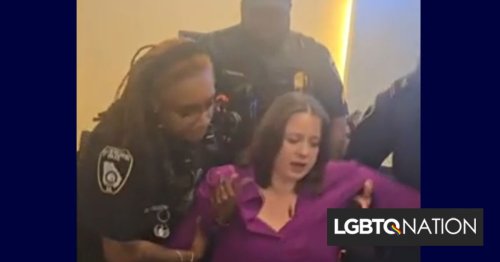 Police officers forcibly remove mom of trans kid from meeting for saying just one word - LGBTQ Nation